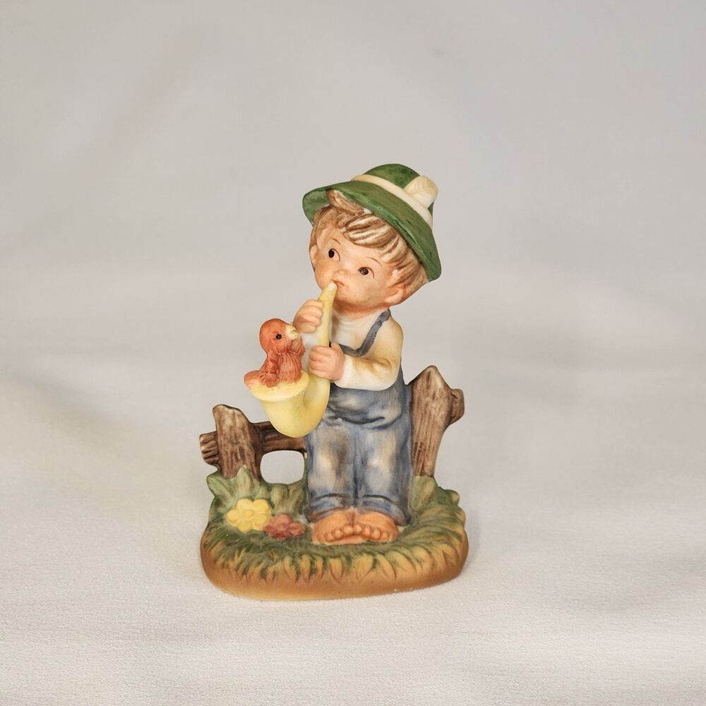 Napco Vintage Porcelain Figurine Boy Playing Saxophone Red Bird # 176